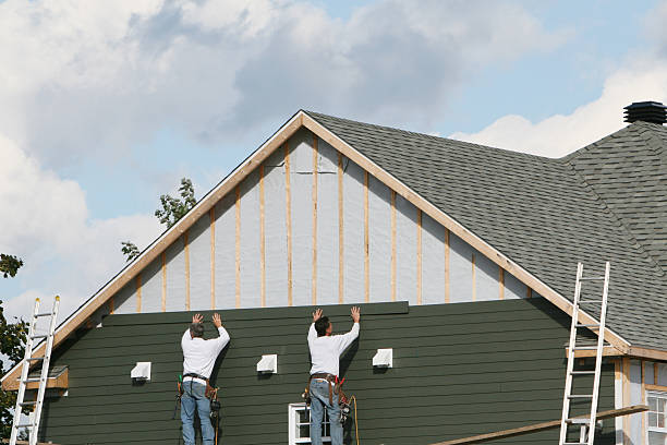 Professional Siding Contractor technician working in Painesville, OH
